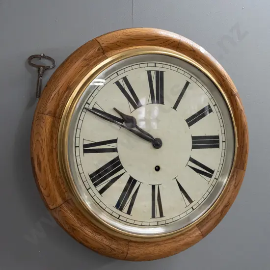 1920s vintage oak-cased Ansonia school clock with brass bezel, with key, going well - has some filled borer holes and