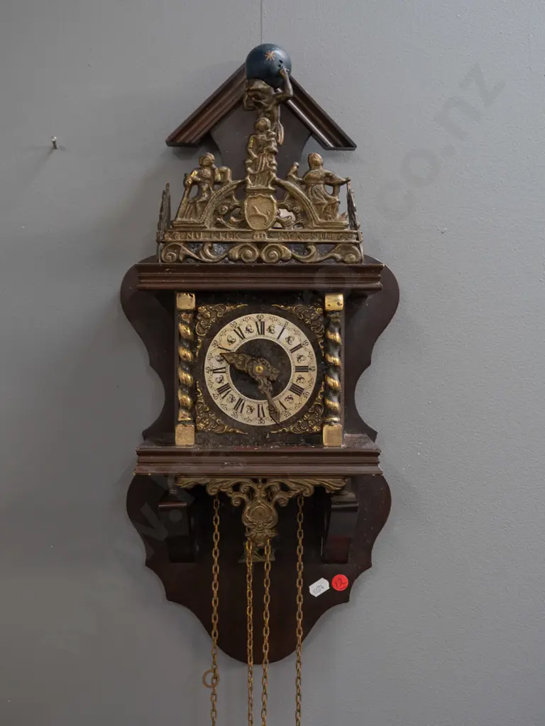 reproduction Dutch wall clock with cast metal pendulum and ornaments, pear-shaped weights, atlas figure & cast motto Image 1++