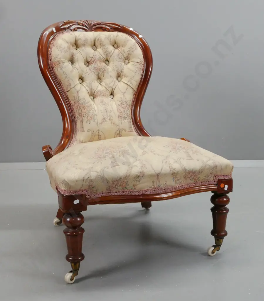 Victorian walnut lady's chair with shaped front, turned front legs on porcelain cupped casters, floral upholstered seat Image 1++