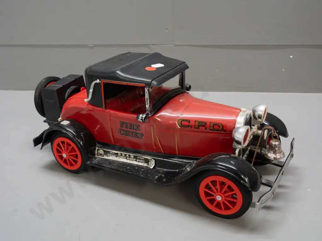Jim Beam automotive decanter - 1928 Ford fire chief vehicle - has contents, label worn but intact, some discolouration Image 1++