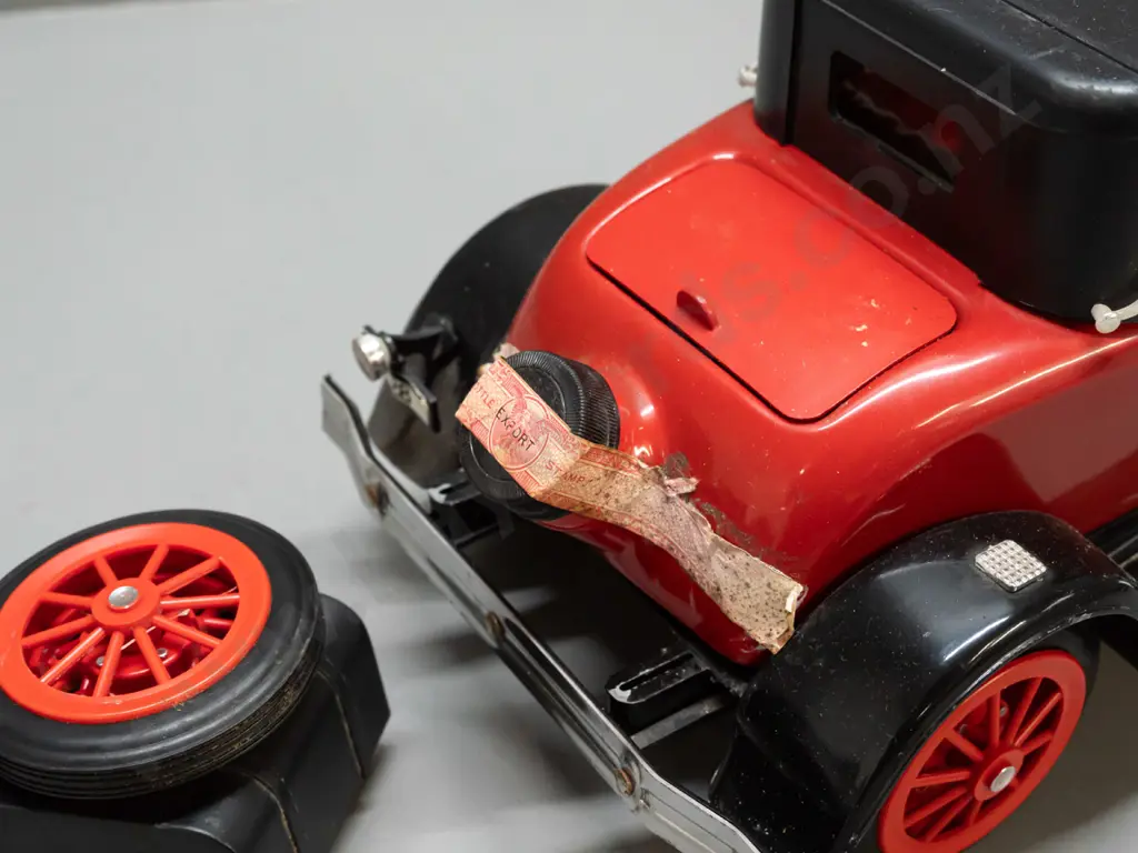 Jim Beam automotive decanter - 1928 Ford fire chief vehicle - has contents, label worn but intact, some discolouration Image 1++