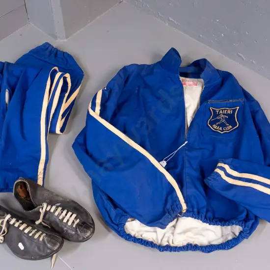 retro athletic outfit with track pants, top and spike shoes - embroidered "Taieri H. & A.A. Club" patch - age wear and