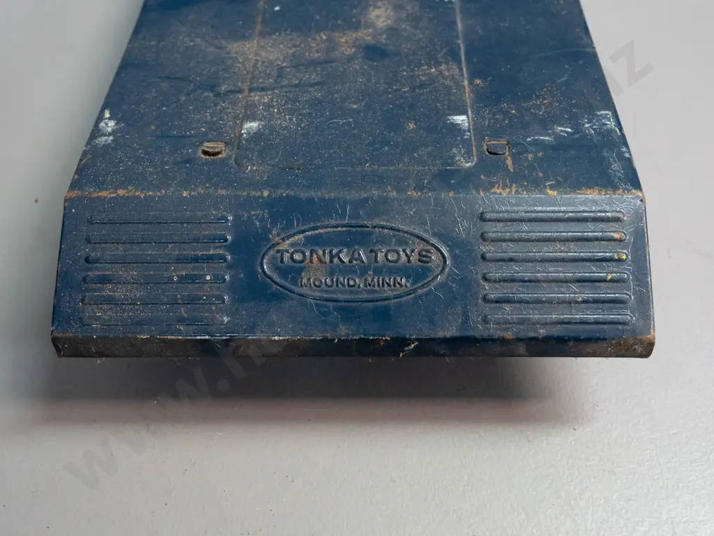 2 Tonka steel toy vehicles - Mighty Tonka dozer and a blue cab w/ flatbed trailer - Tonka New Zealand stickers on door Image 1++