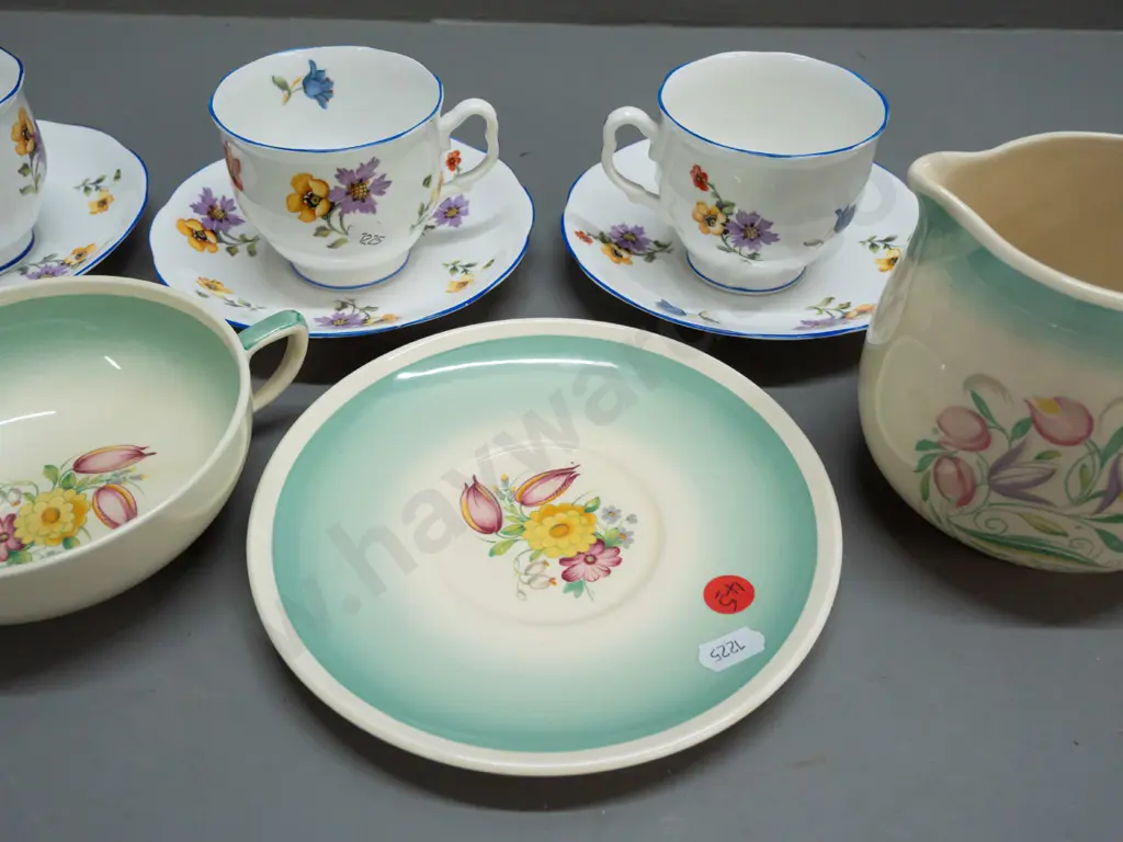 3 pieces Susie Cooper and 4 vintage Royal Albert cups & saucers with floral decoration and blue rims. Susie Cooper jug Image 1++