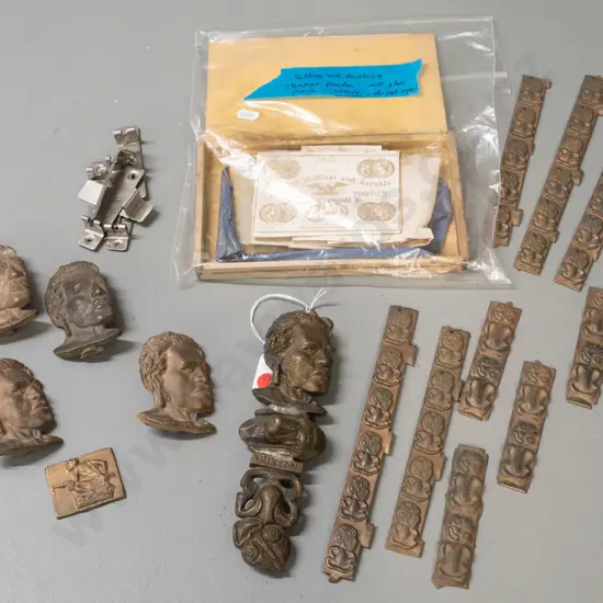 assorted Maori tiki and chief motif cast metal pieces, most marked "King" on back including steel door knocker brackets