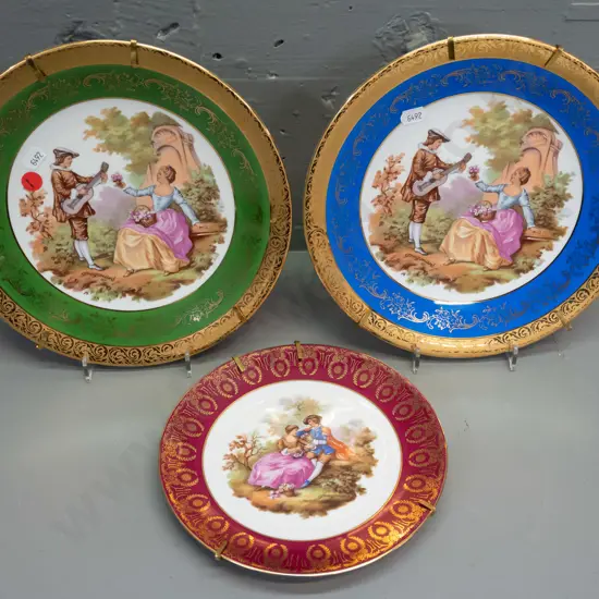 3 Limoges romance scene cabinet plates with metal stands - the 2 larger are D-240