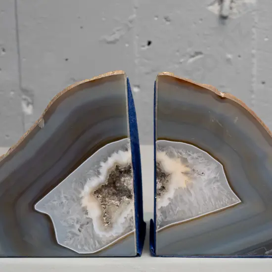 pair of polished agate geode book-ends with baize lining on 2 sides H-140 W-260 across the pair