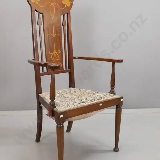 walnut arts & crafts stye open-armed high back chair with mixed timber inlaid decoration and pierced cutouts in back,