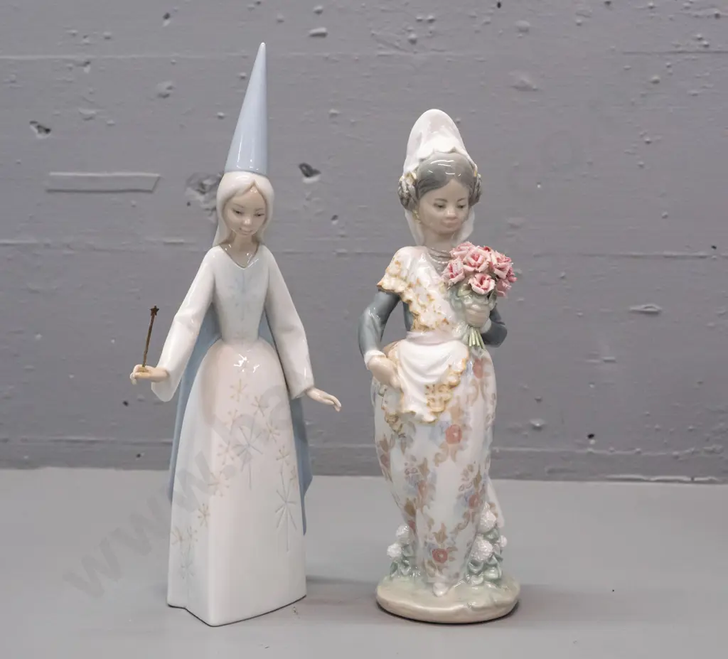 2 Lladro figures - fairy princess or sorceress and woman with floral bouquet. Taller H-280 has bent wand, glue residue Image 1++