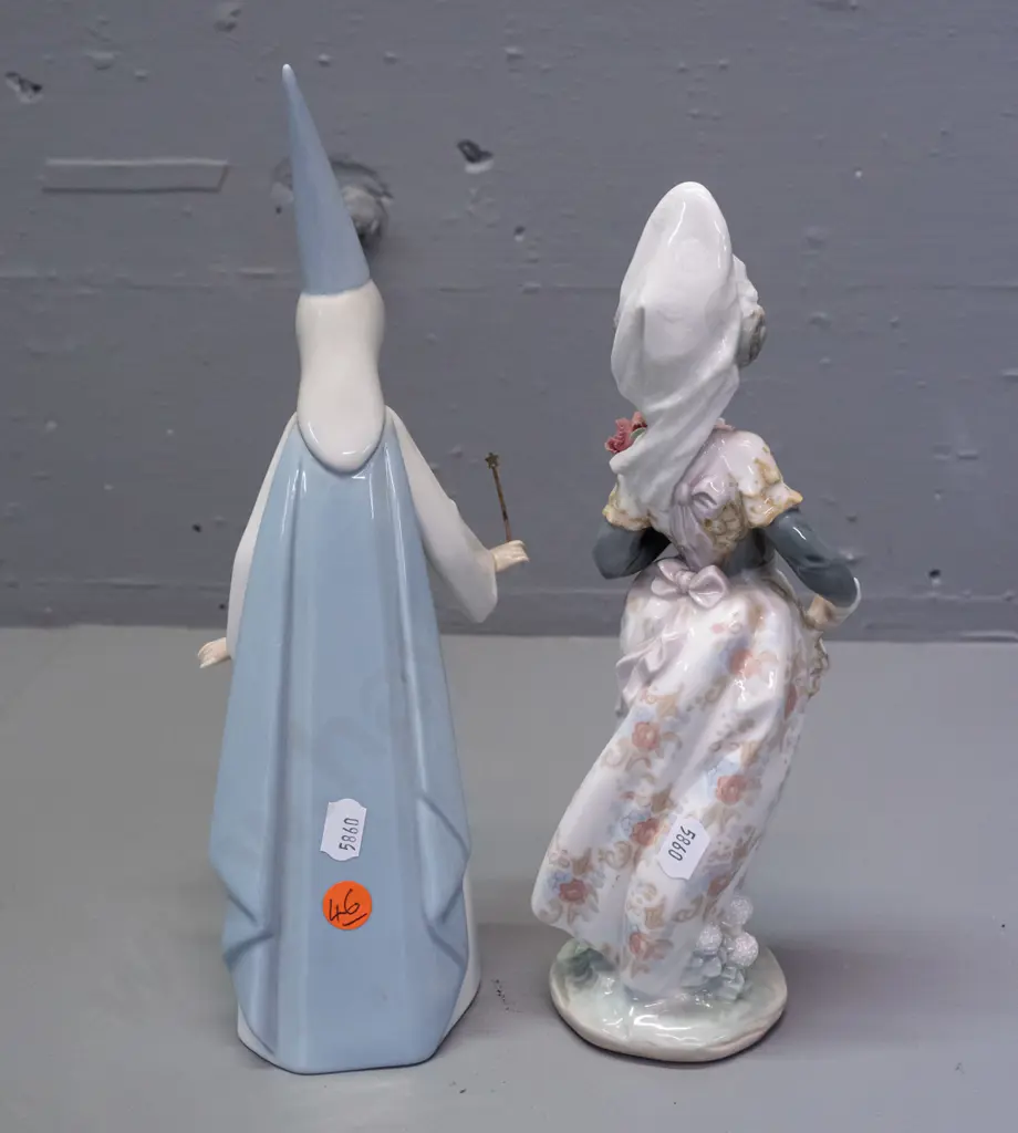 2 Lladro figures - fairy princess or sorceress and woman with floral bouquet. Taller H-280 has bent wand, glue residue Image 1++