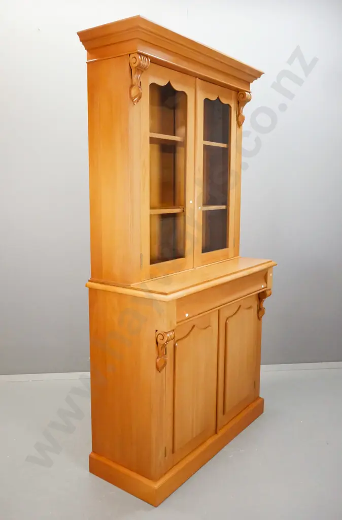 reproduction kauri colonial style bookcase chiffonier w/ shaped cornice, carved corbels, 2 shield shaped doors in base - Image 1++