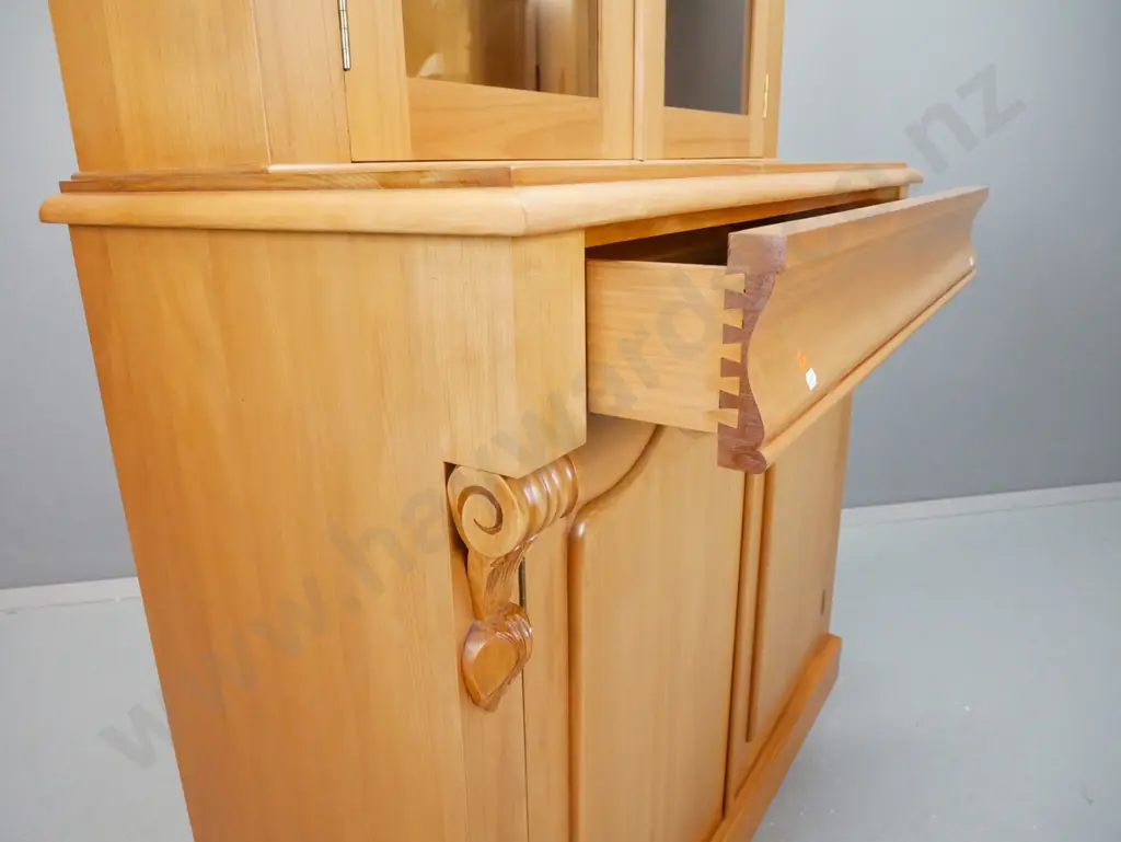 reproduction kauri colonial style bookcase chiffonier w/ shaped cornice, carved corbels, 2 shield shaped doors in base - Image 1++