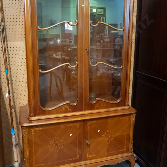 French style display top cupboard w/ shaped front on short cab legs, 2 solid and 2 glazed doors, walnut veneer with
