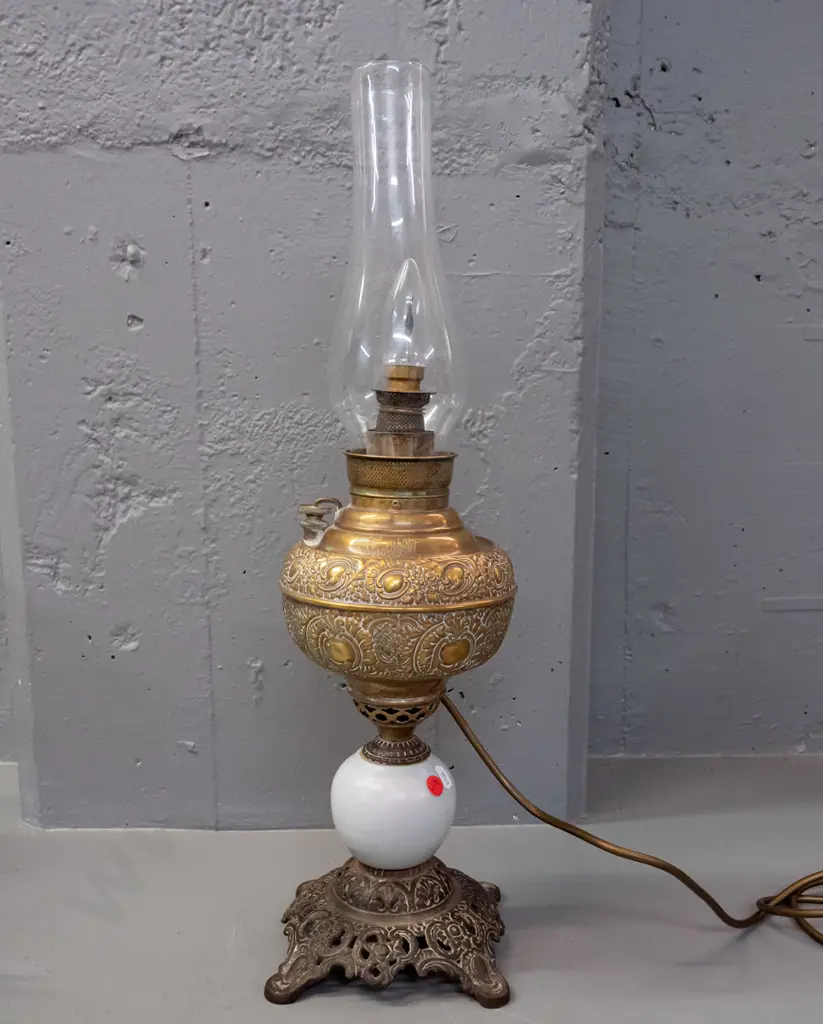 vintage Miller USA kerosene lamp with cast metal and ceramic base, converted to electric bulb, glass chimney sits loose Image 1++