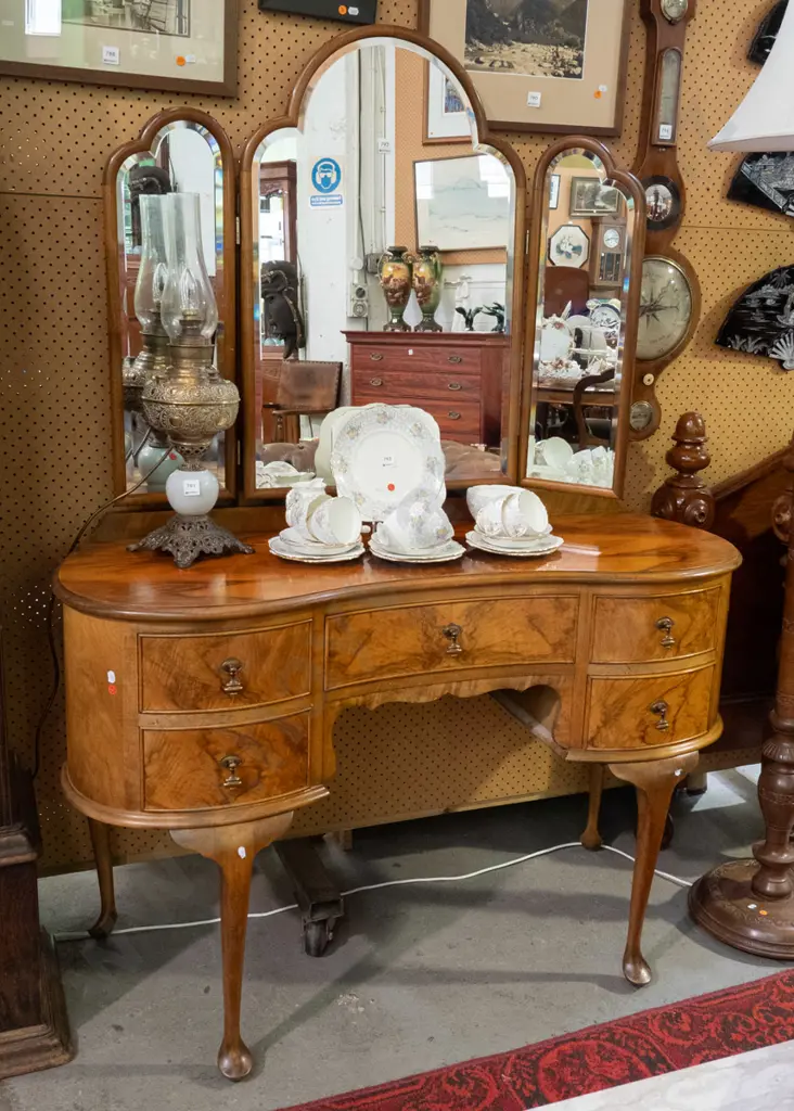 vintage walnut veneer cab leg kidney shaped dressing table with shaped bevelled edge 3 panel mirror top, 5 drawers Image 1++