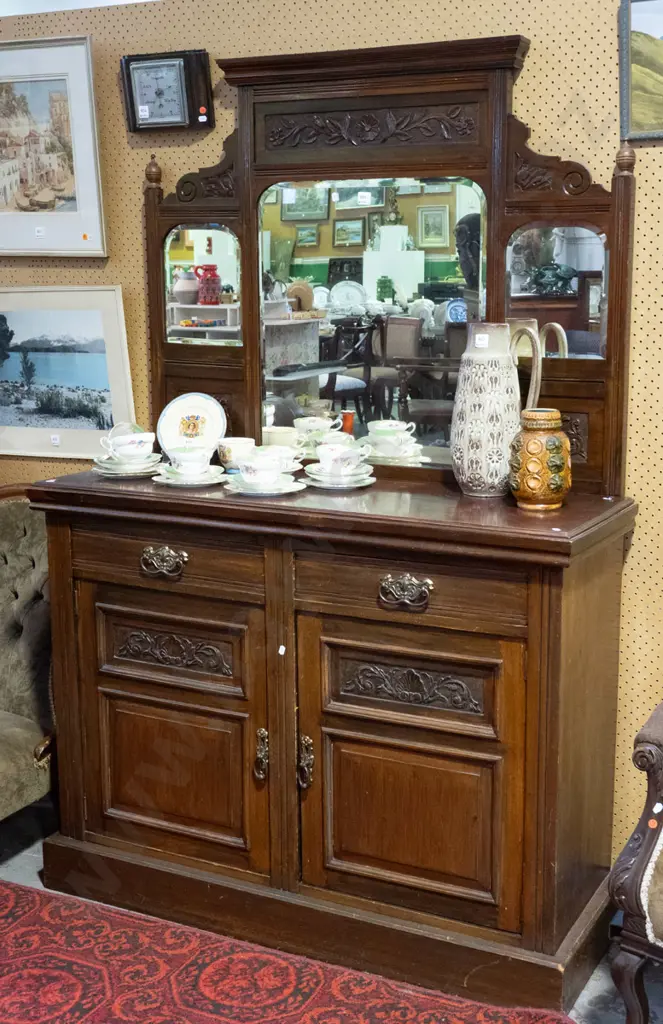 Edwardian mahogany mirror-back sideboard with carved panels in top w/ 3 arched beveled edge mirrors, 2 panelled doors Image 1++