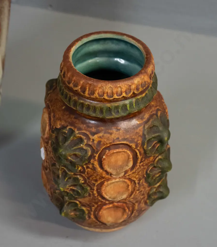2 German pottery vases with embossed decoration - large handled jug vase has small glaze faults, one at bottom rim and Image 1++