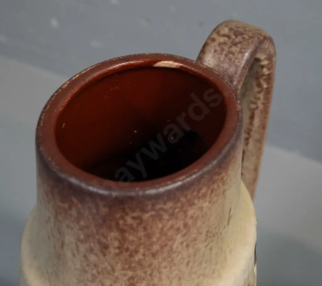 2 German pottery vases with embossed decoration - large handled jug vase has small glaze faults, one at bottom rim and Image 1++