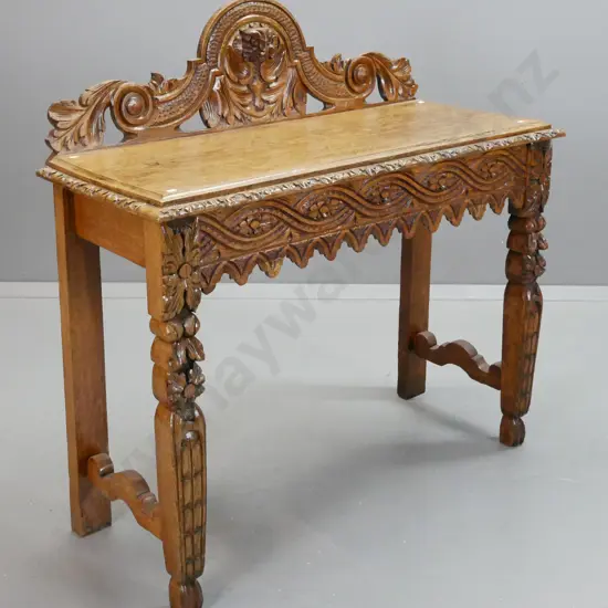 vintage rustically-carved oak side table with carved crested back and frieze, square tapered legs & shaped supports -