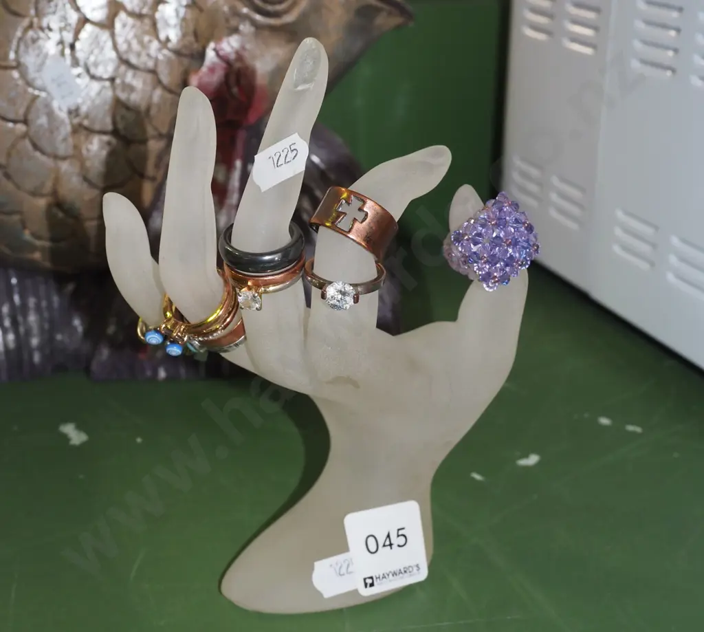 glass hand ring stand (chip to one fingernail) and various rings H180 Image 1++