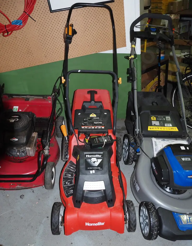 rechargable electric Homelite electric lawn mower - battery in office Image 1++