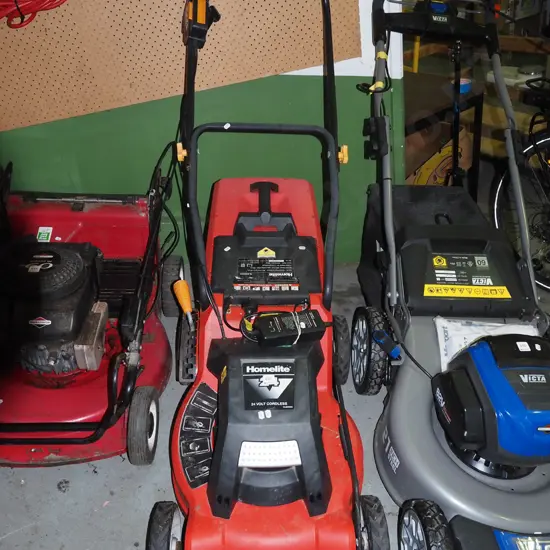 rechargable electric Homelite electric lawn mower - battery in office