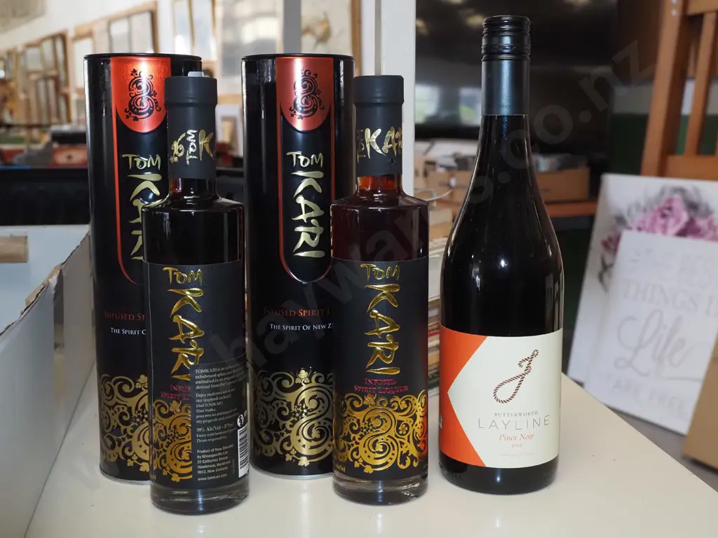 bottle of Layline pinot noir 2020, 2x bottles of Ton Kari spirit liqueur Image 1++