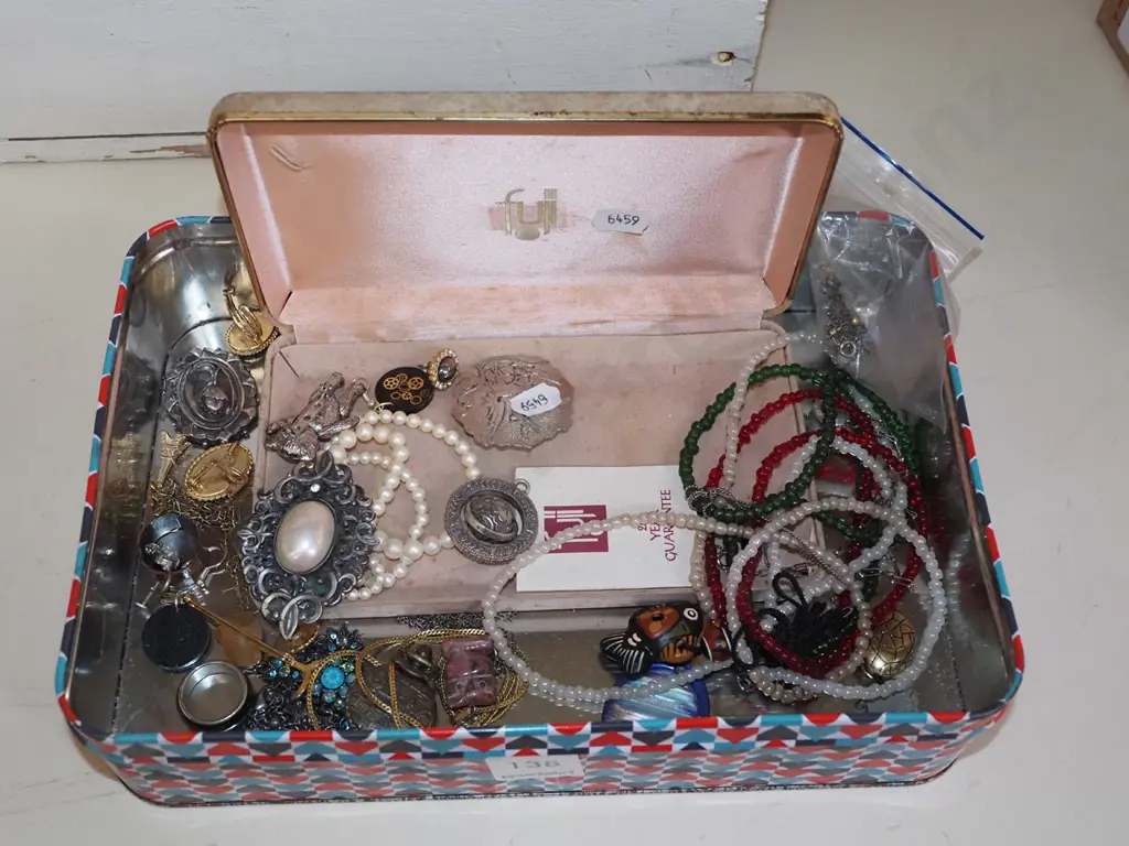 tin of costume jewellery Image 1++