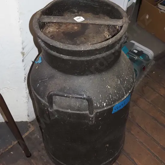 rusty painted milk can