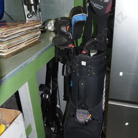 golf clubs and trundler