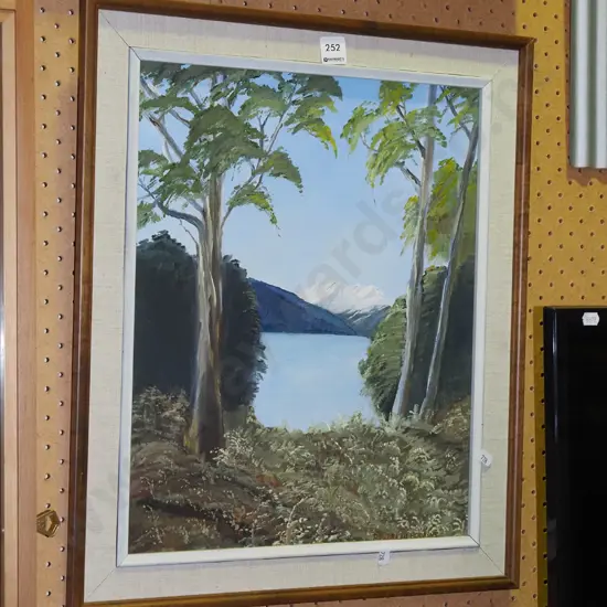 framed oil - lake and moutain scene