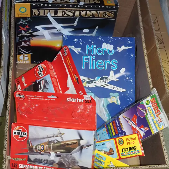 yet to be assembled plane model kits, paper gliders etc