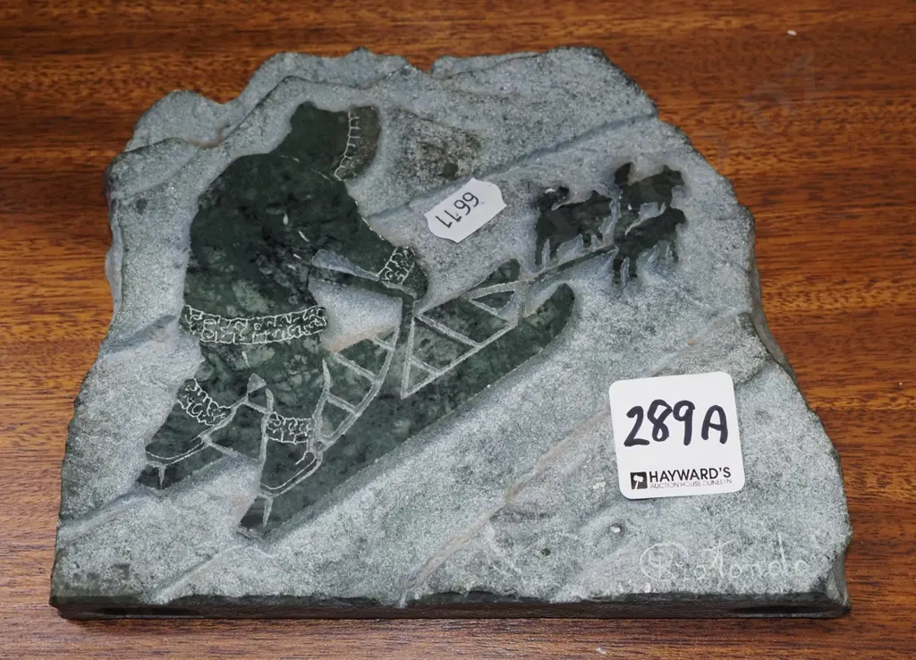 Canadian dog sled scene carving in marble Image 1++