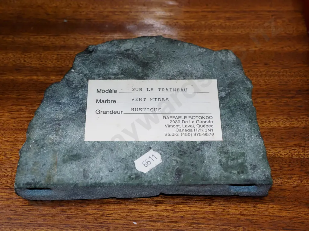 Canadian dog sled scene carving in marble Image 1++