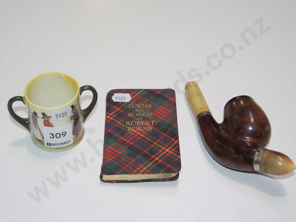 small Royal Doulton double handled cup (small crack),small book of Robert Burns poems, pipe w/ crack to stem Image 1++