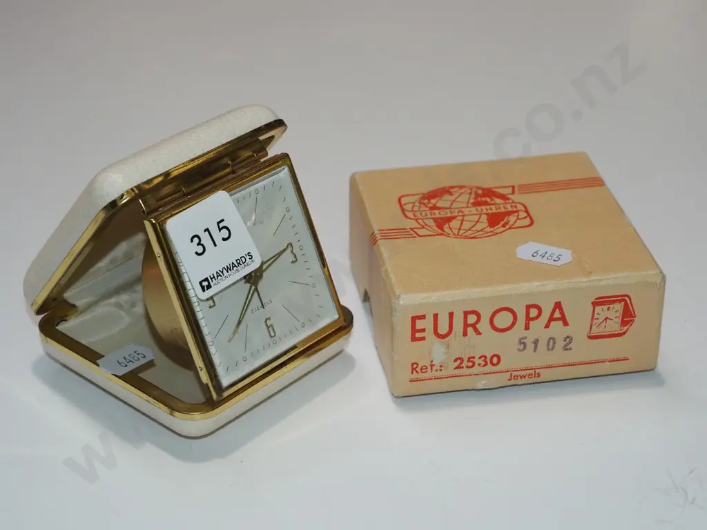 cased travel alarm clock Image 1++