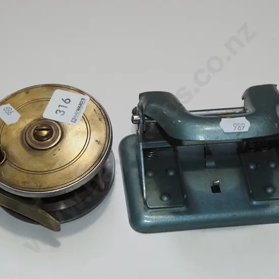fly fishing reel & hole punch