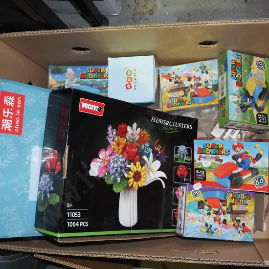 box of plastic brick toys