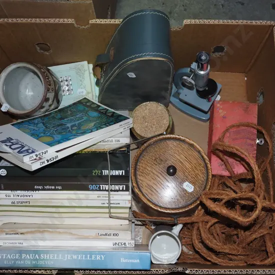 box of Landfall back issues, ice bucket, jute rope, etc