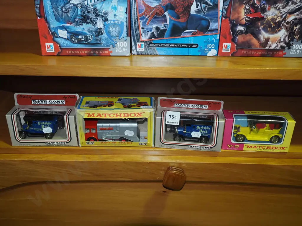 4 boxed model vehicles, one box damaged Image 1++