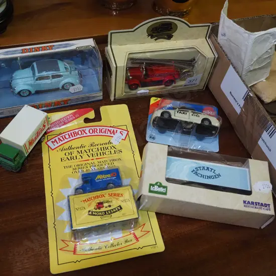 4 carded and one loose model vehicles