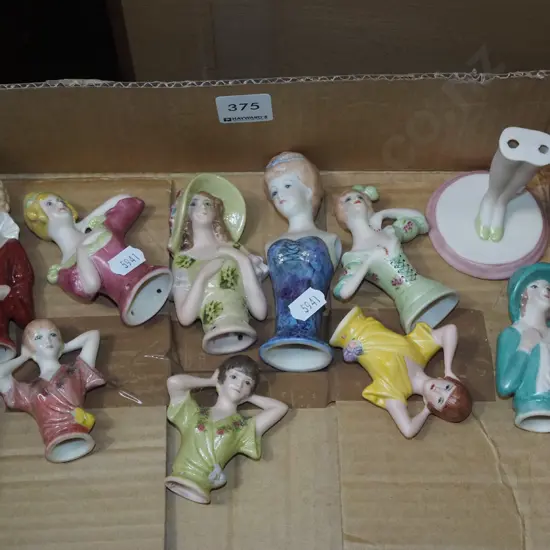 box of half dolls