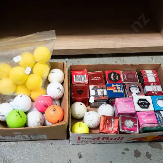 2x boxes of golf balls