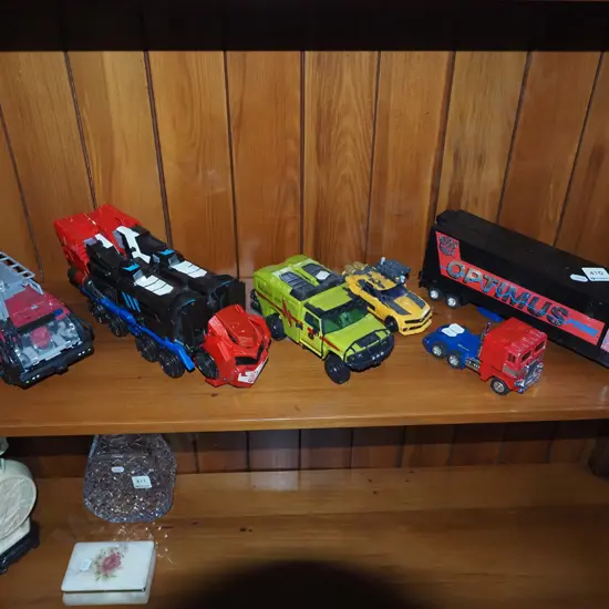 shelf of model vehicles