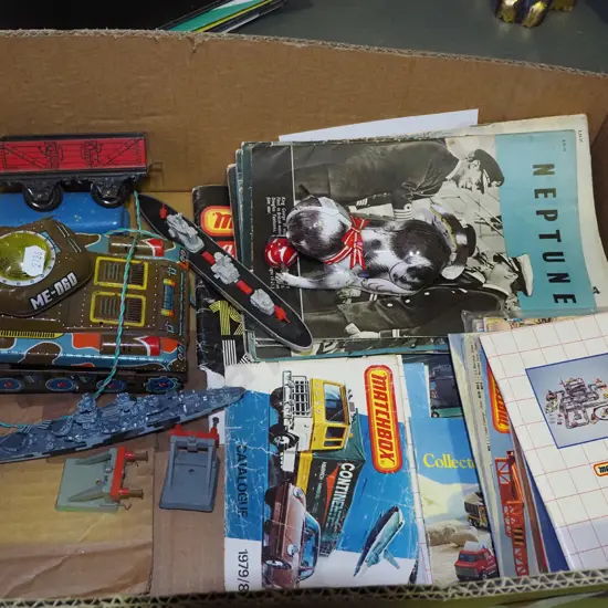 box; matchbox catalogues, Neptune magazines, tin toys etc
