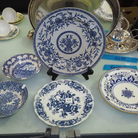blue and white plates and bowls