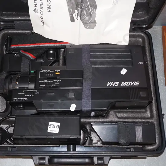 cased Hitachi VHS camcorder