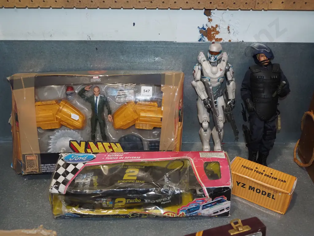 x men toys and damaged box, remote control car in damaged box, 2x action figurines etc Image 1++