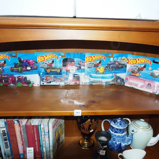 4x carded HotWheels novelty trucks and trailers