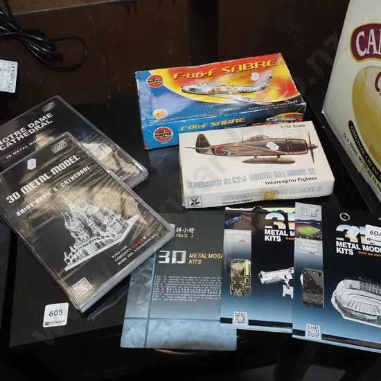 yet to be assembled model kits; cathedrals, planes etc